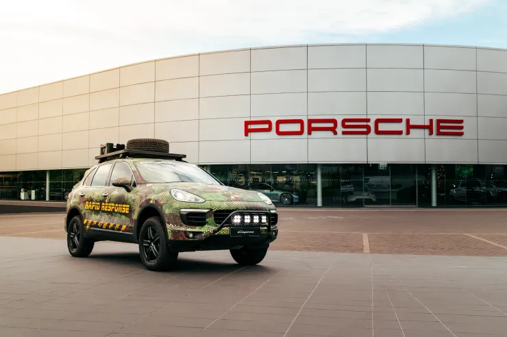 Porsche Cayenne rapid-response vehicle wrapped in camouflage